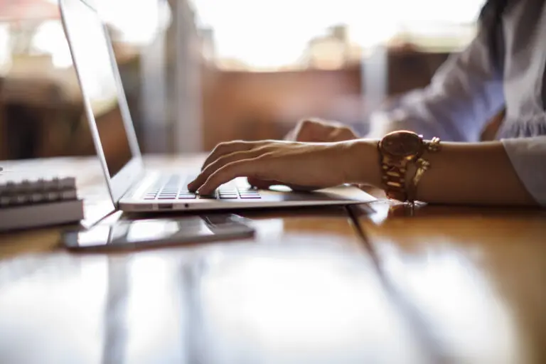 hands typing on keyboard, visiting law firm website