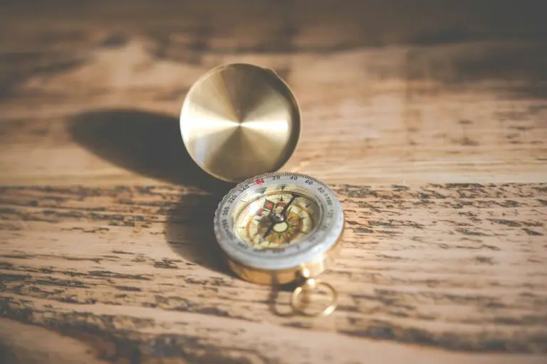 Open compass on table